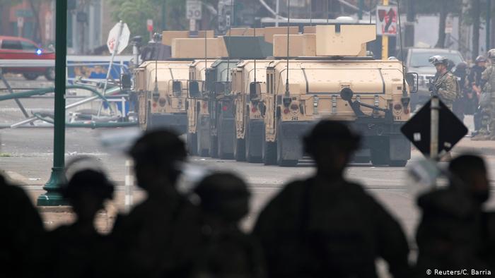 Национальная Гвардия приведена в боевую готовность в Миннеаполисе Фото: Reuters Национальная Гвардия приведена в боевую готовность в Миннеаполисе Фото: Reuters